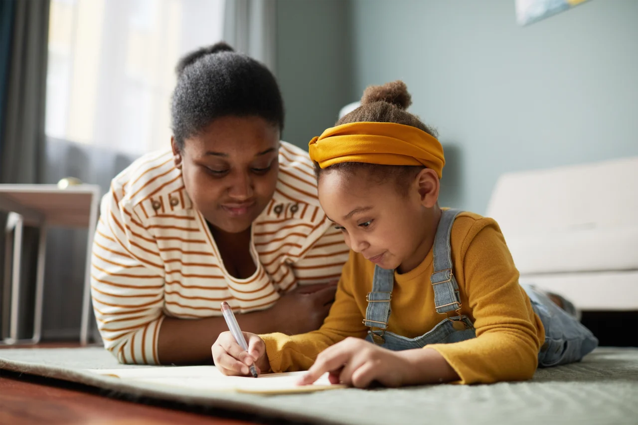 Mother With Child coloring in a color book.